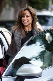 Stacey Lauretta Dash standing outside her car