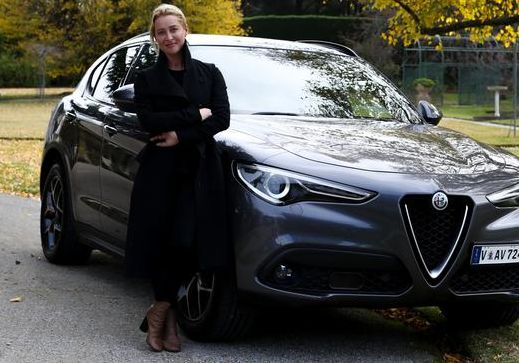 Jay Bowen's ex-wife, Asher Keddie posing with her car