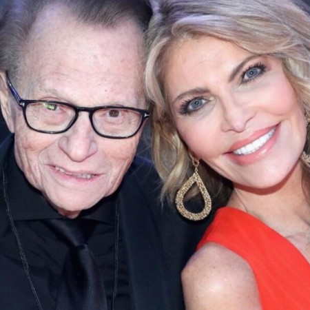 Larry King posing with his latest wife, Shawn king