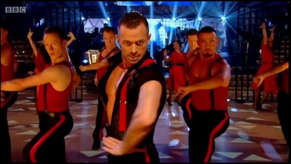 Artem Chigvintsev dancing at the stage