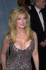 Morgan Fairchild with the caposin for the photo