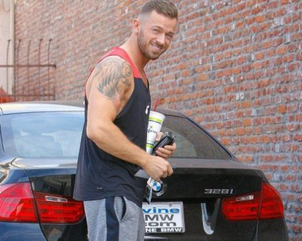 Artem Chigvintsev outside his car