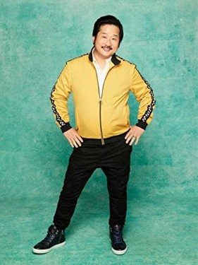 Bobby lee posing for a photo