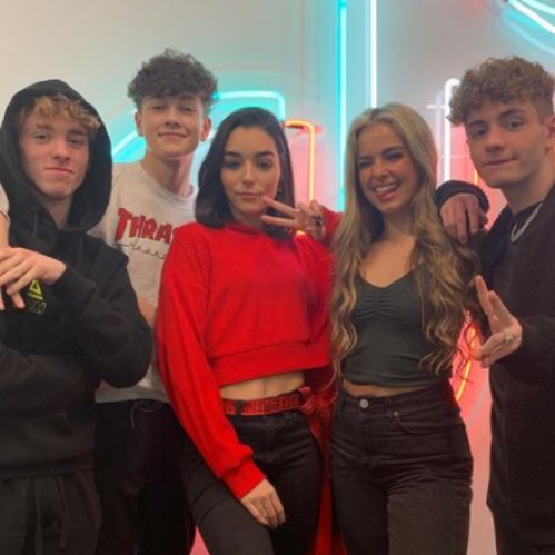 Luca posing with his TikTok Mates