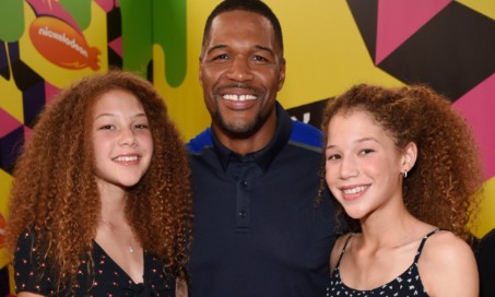 Isabella Strahan with her father and twin sister 
