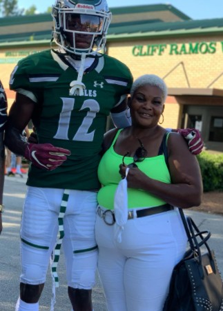 Travis Hunter with his grandmother