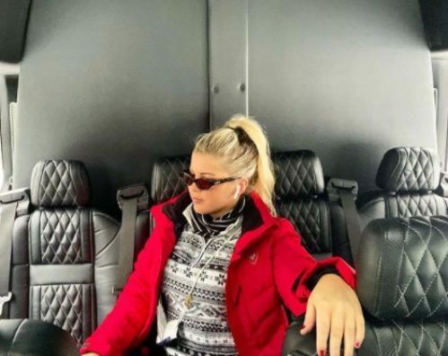Ashley posing inside aeroplane