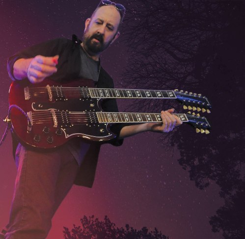 Christian Nesmith with his guitar