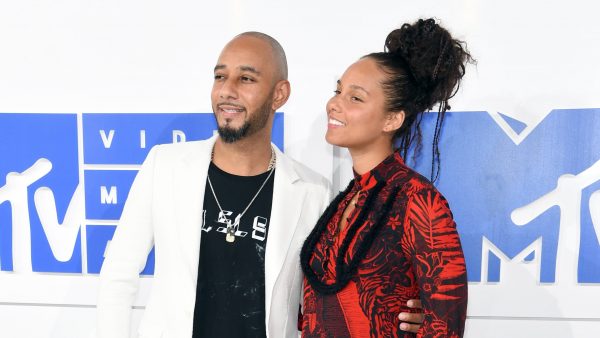 Swizz Beatz with his wife