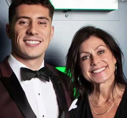 Ian Book with his mother