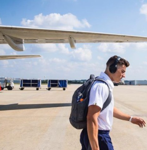 Ian Book in front of air plane