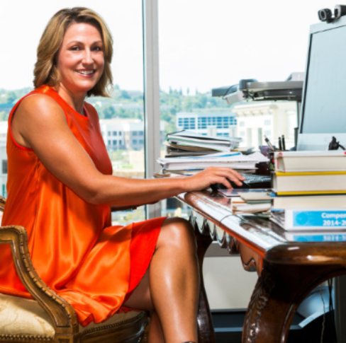 Heather Bresch posing in her office