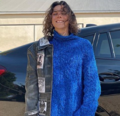 Eddie Benjamin posing in car
