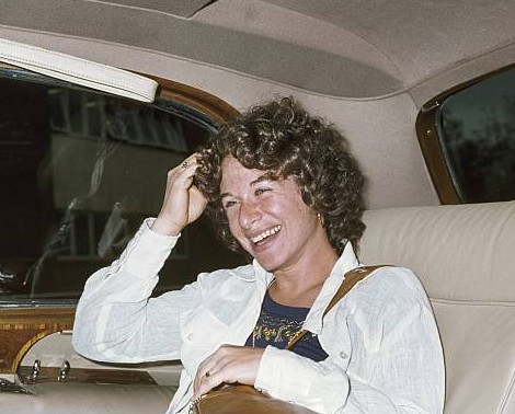 Sherry Goffin's mother, Carole King posing inside her car