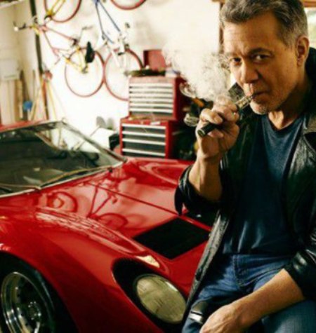 Wolfgang Van Halen's father posing in car