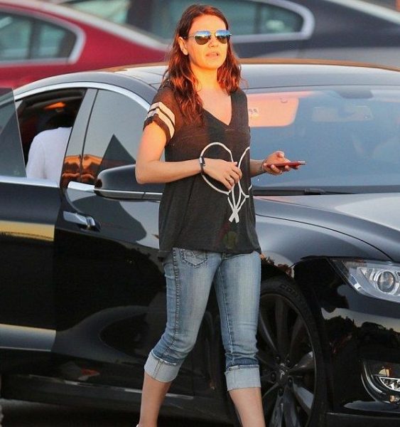 Mila Kunis outside her car