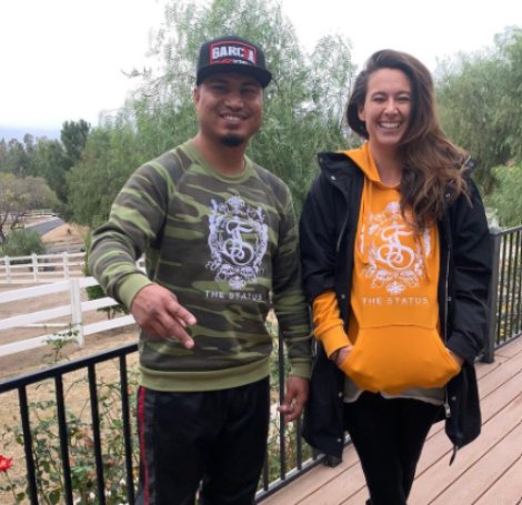 Mikey Garcia posing with wife