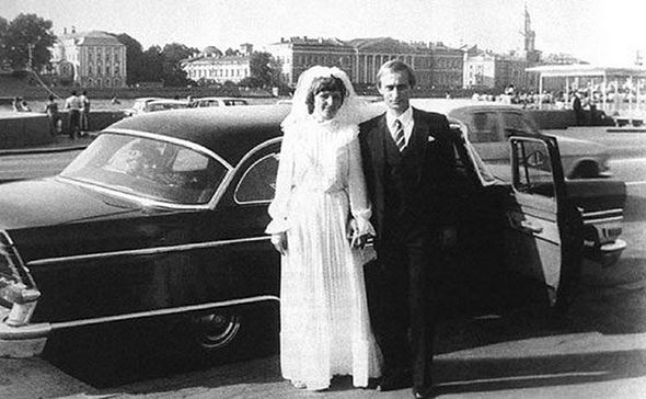 Lyudmila Aleksandrovna Ocheretnaya picture infront of the car with ex-husband 