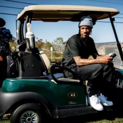 DeMar DeroZan posing in car