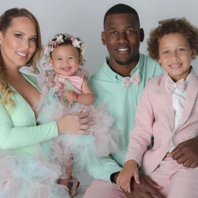 Leydis Serrano posing with her children and husband