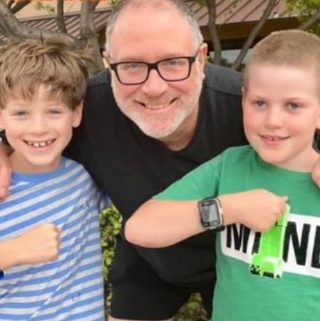 Jeff Younger spotted infront of the house with son