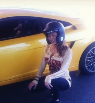 Michelle Velasquez posing in car