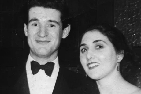 Robert Arnold posing with wife
