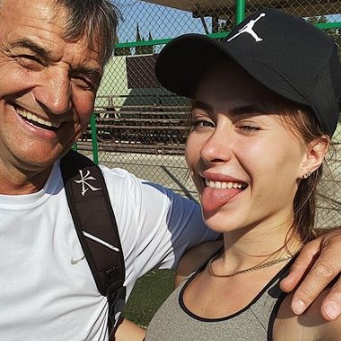 Polina Knoroz posing with her father