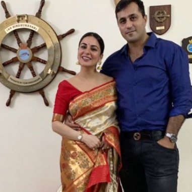 Rahul Nagal and his wife, Shraddha Arya in frame