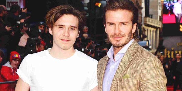 Brooklyn Beckham with his father