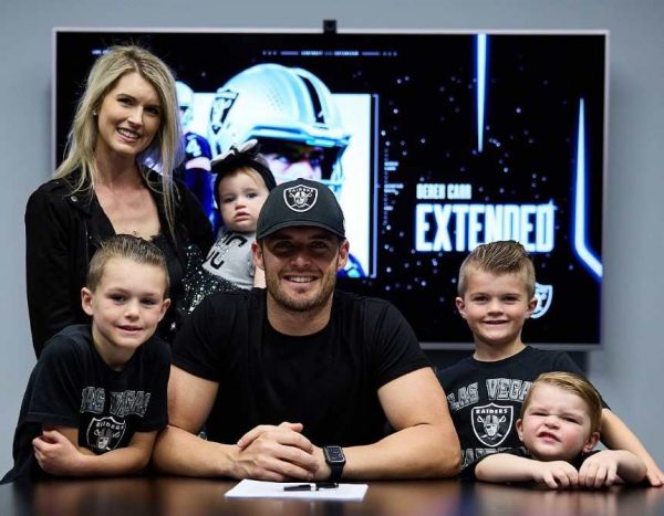 Derek Carr with his kids and wife