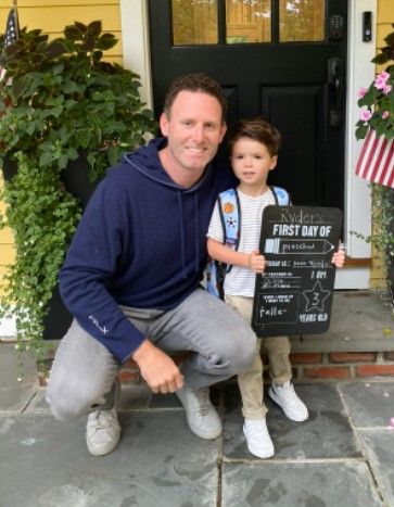 Ryan Whitney with his son