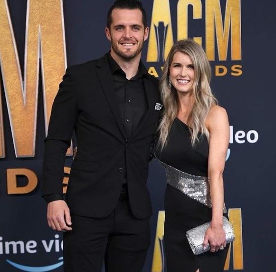 Derek Carr with his wife