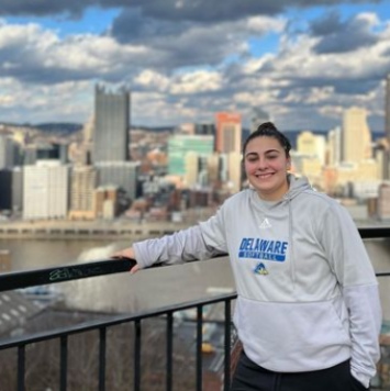Lauren Barnett posing on top of building