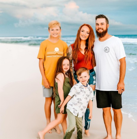 Taylor McKinney with childrens