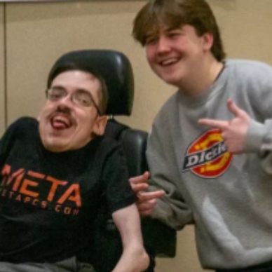 Ricky Berwick posingwith his friend