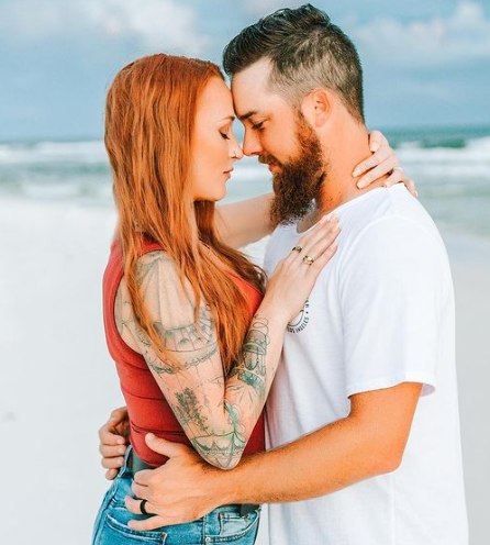 Taylor McKinney with wife