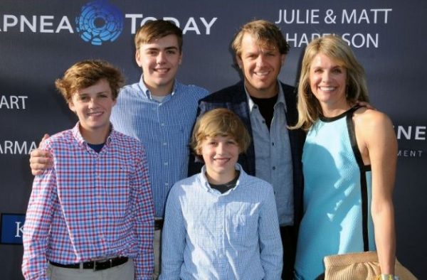 Katie Boehly with her husband and sons