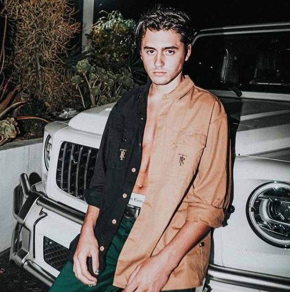 Isaak Presley with his car 