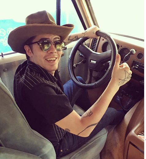 Rusty Cage in his car