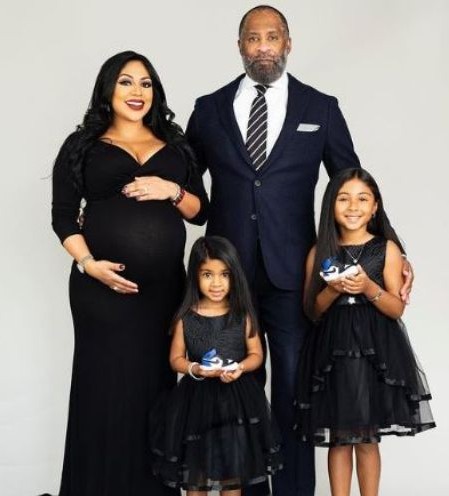 Zuri Kye Edwards with his wife and daughter 