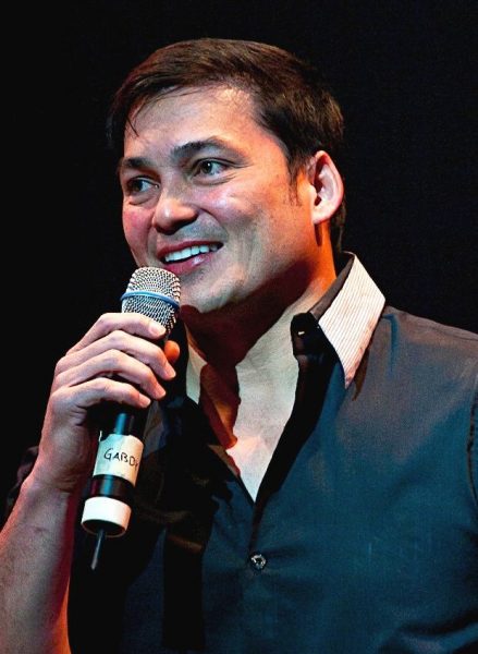 Genevieve Yatco Gonzales's husband in the frame