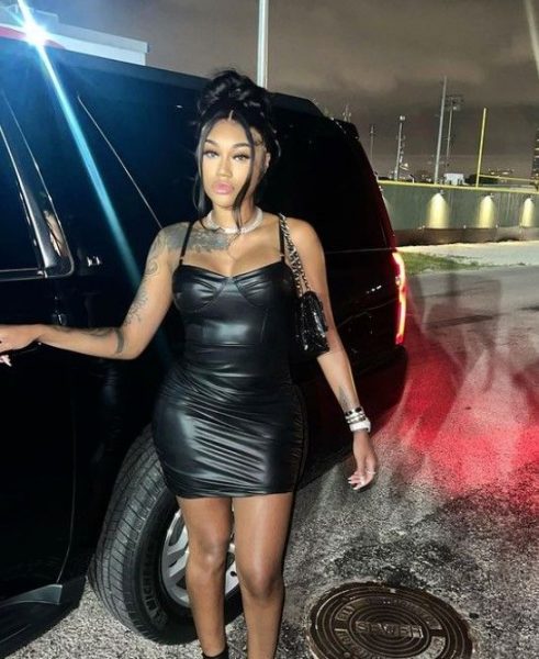 Jania Jackson outside her car