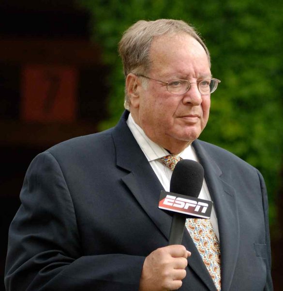 Hank Goldberg delivering the news