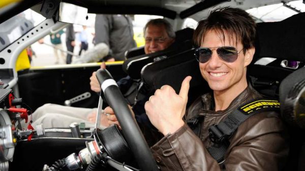  Lee Ann Mapother's brother Tom Cruise posing inside the car
