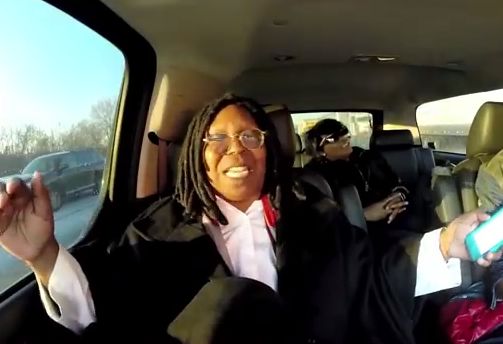Whoopi Goldberg inside her car