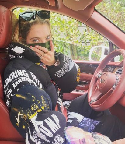 Ashley Benson in her car