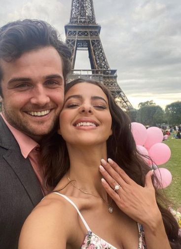 Beau Mirchoff with his fiance Jenny Meinen showing her engagement ring
