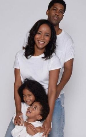 Faune Chambers Watkins with her husband and children