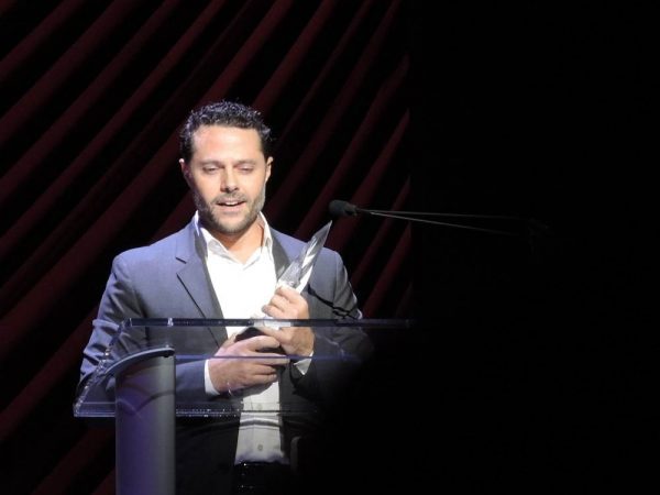 Joshua Bergasse after winning an Award